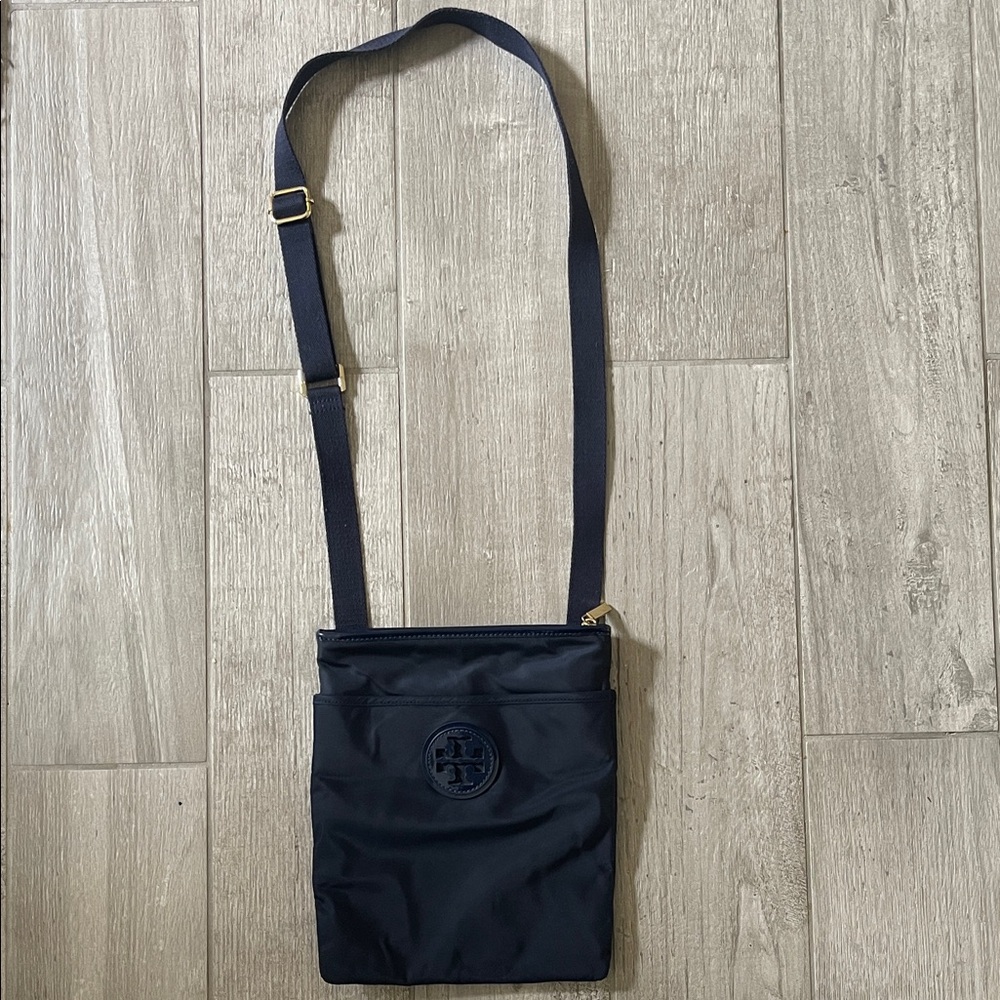 Classy Tory Burch Navy Crossbody Bag
9”W x 10 3/4”L - Picture 4 of 4